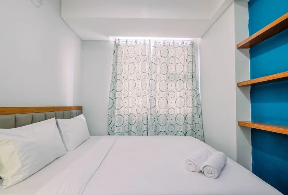 Homey and Comfortable 1BR Apartment at Royal Olive Residence - main photo