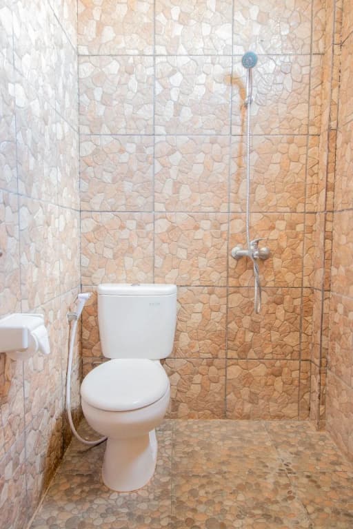 OYO 401 The Frog Homestay Sanur - photo 9