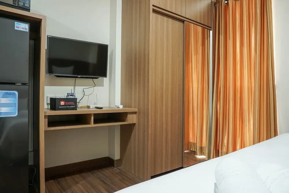 Minimalist And Comfy Puri Orchard Studio Apartment - photo 2