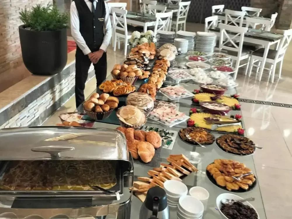 Grand Plaza Hotel - photo 11