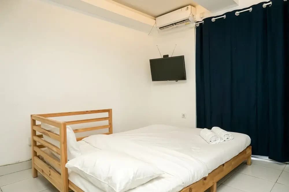Simply White and Compact Studio at Amethyst Apartment - photo 3