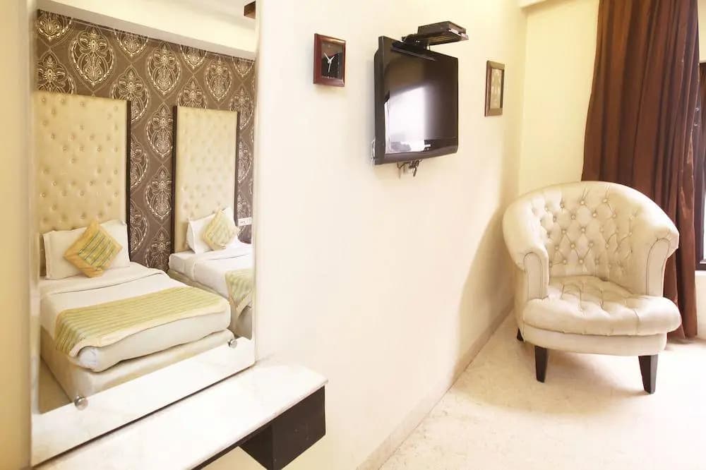Capital O 312 Hotel Aster Inn - photo 13