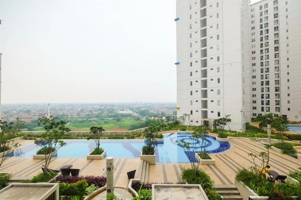 Spacious Bassura City Apartment with Pool View - photo 11