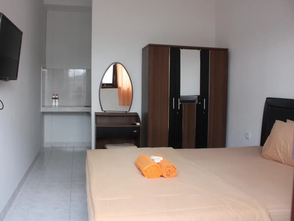Nida Rooms Gelogor Carik Denpasar at Guest House Orchid - photo 4