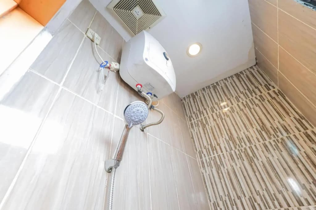 Wisma Basco Syariah by OYO Rooms - photo 21