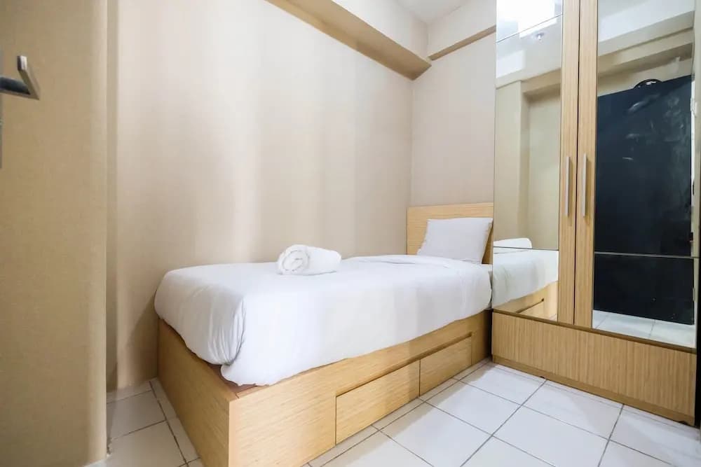 Simple 2BR Pancoran Riverside Apartment By Travelio - photo 1