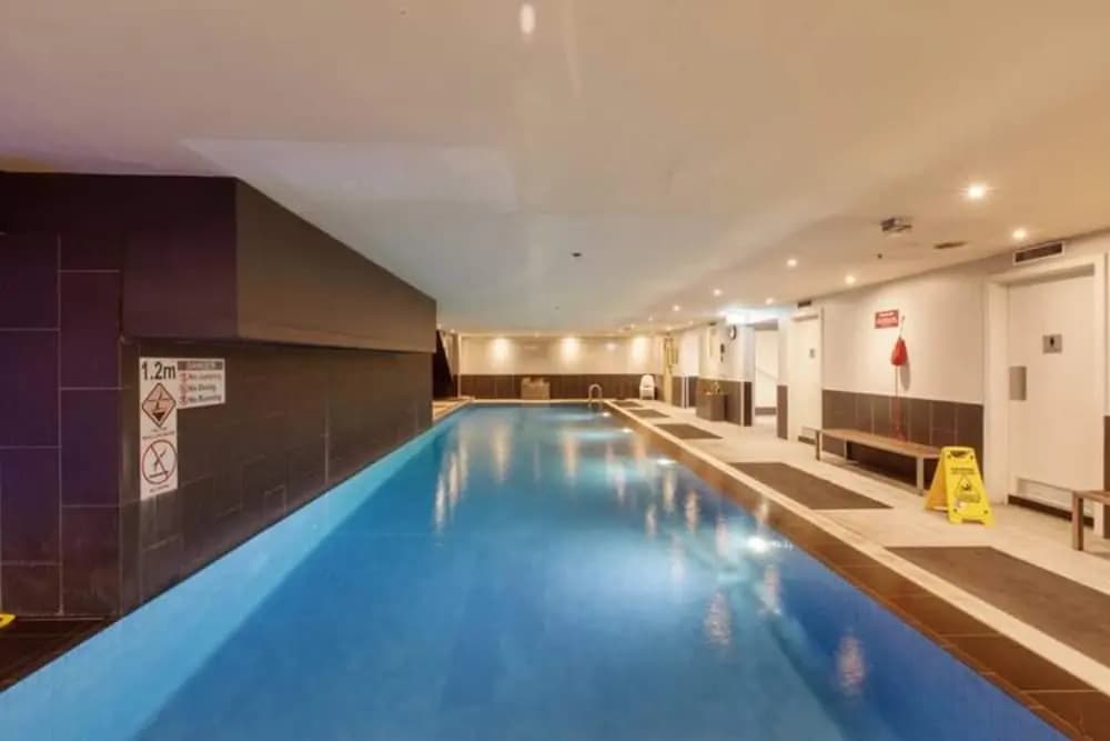 Incredible City Views in Convenient CBD Apartment - photo 9