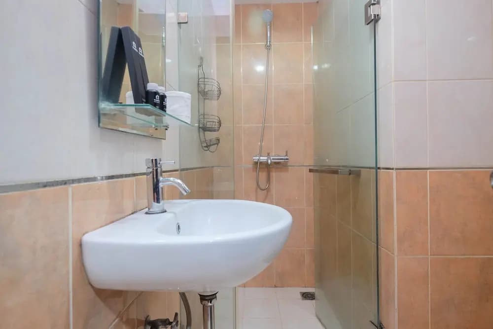 Homey and Nice Studio at Tamansari Sudirman Apartment - photo 6