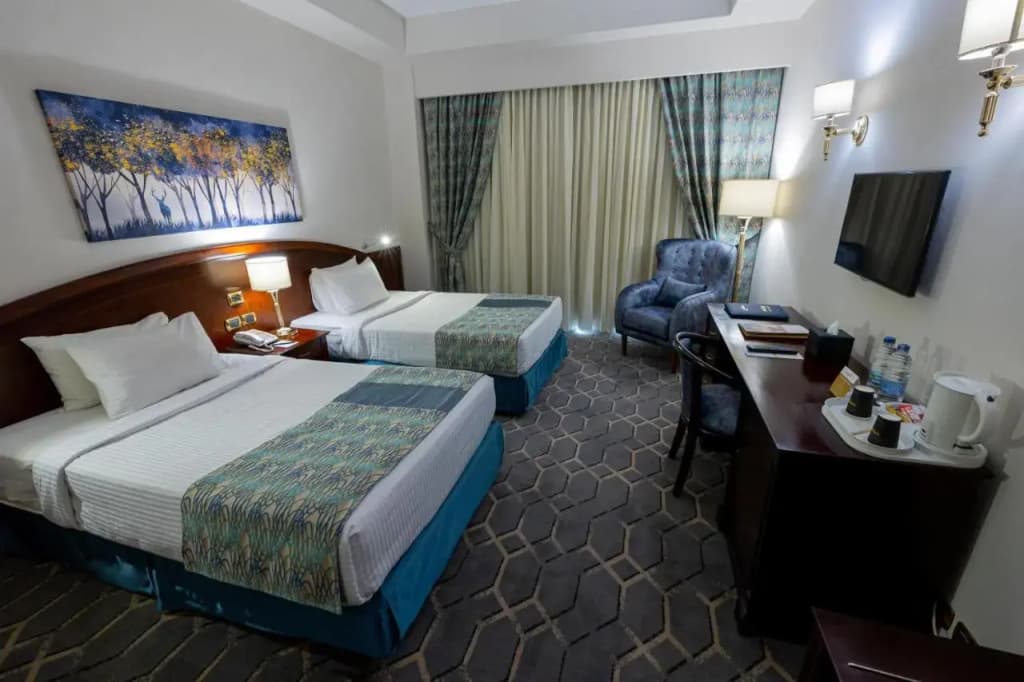 Hotel Triumph Plaza Hotel - photo 11