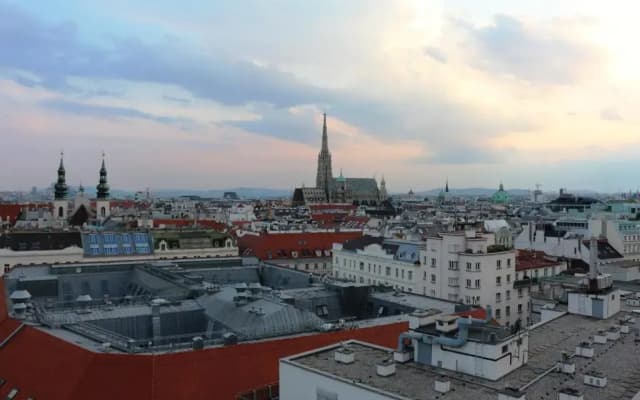 Center Apartment with 360° Rooftop - photo 3
