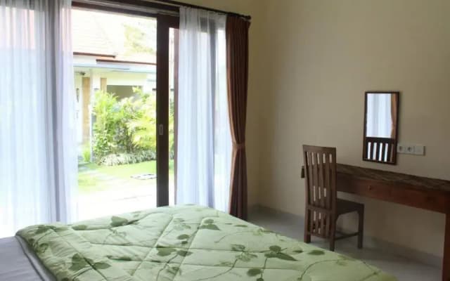 Purnama Guesthouse - photo 2