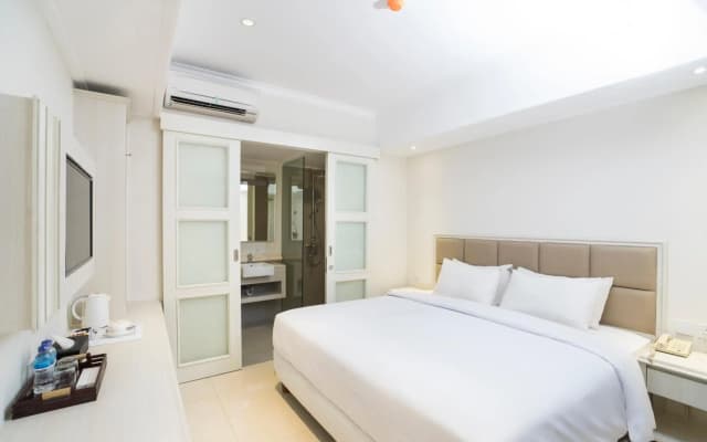 Alron Hotel Kuta Powered by Archipelago - photo 5
