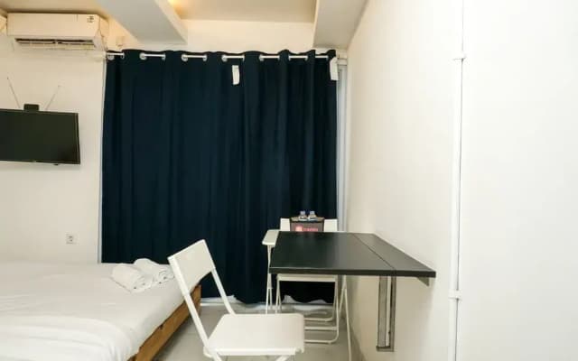 Simply White and Compact Studio at Amethyst Apartment - photo 5