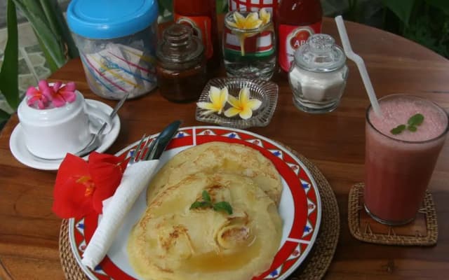 Ojeks Homestay - photo 4