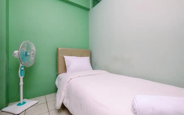 Minimalist And Cozy Style 2Br At Green Pramuka City Apartment - photo 5
