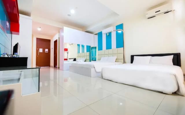 Family Studio Room at Ancol Mansion Apartment By Travelio - photo 4