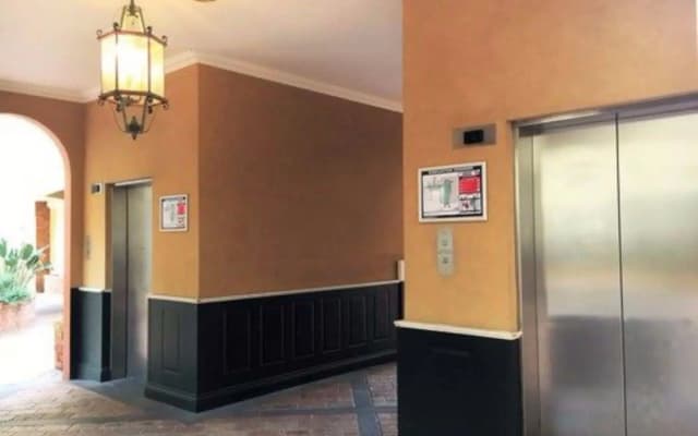 Clocktower Apartment Hotel - photo 2