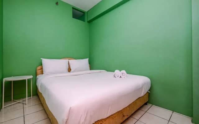 Minimalist And Cozy Style 2Br At Green Pramuka City Apartment - photo 2
