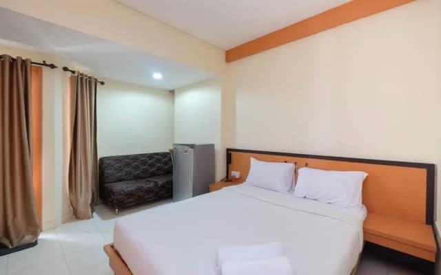 Homey and Nice Studio at Tamansari Sudirman Apartment - photo 4