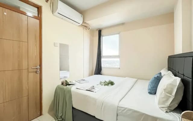 Basic 2Br Apartment At Green Palm Residence - photo 5