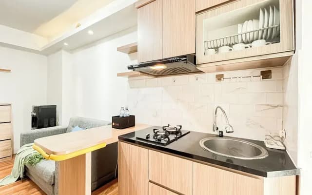 Warm And Comfy 2Br At Bassura City Apartment - photo 5