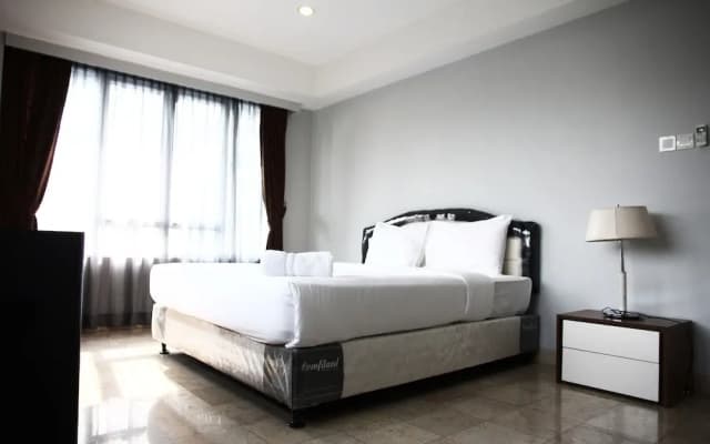 Classic Brawijaya Apartment with Pool View - photo 4