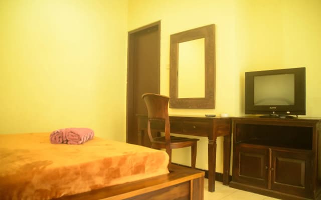 Super OYO 1654 Maha Bharata Kuta Inn - photo 4