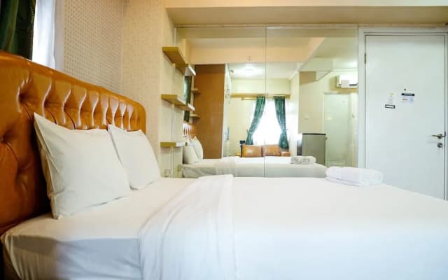 Furnished Studio with Comfortable Design Green Pramuka Apartment - photo 2