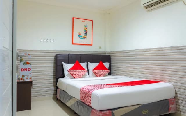 Oyo 730 Wisma 38 - photo 2