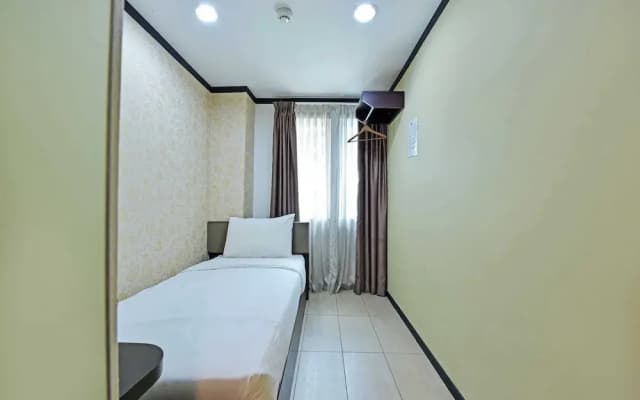 OYO 91009 One Enigma Hotel - photo 4