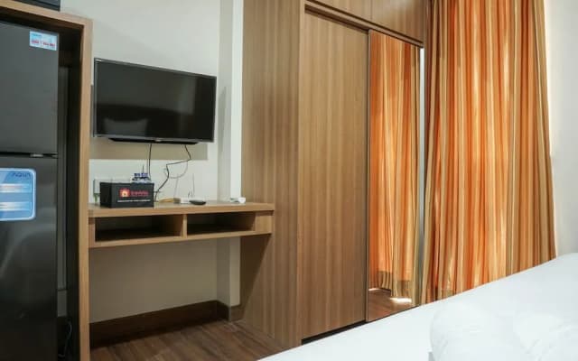 Minimalist And Comfy Puri Orchard Studio Apartment - photo 2