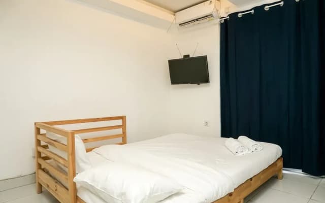 Simply White and Compact Studio at Amethyst Apartment - photo 3
