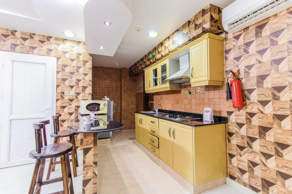OYO 109 Al Thabit Modern Hotel Apartment - photo 15
