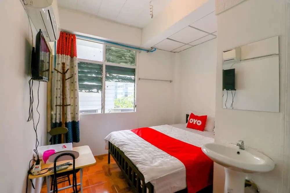 Happyland Guesthouse by OYO Rooms - main photo