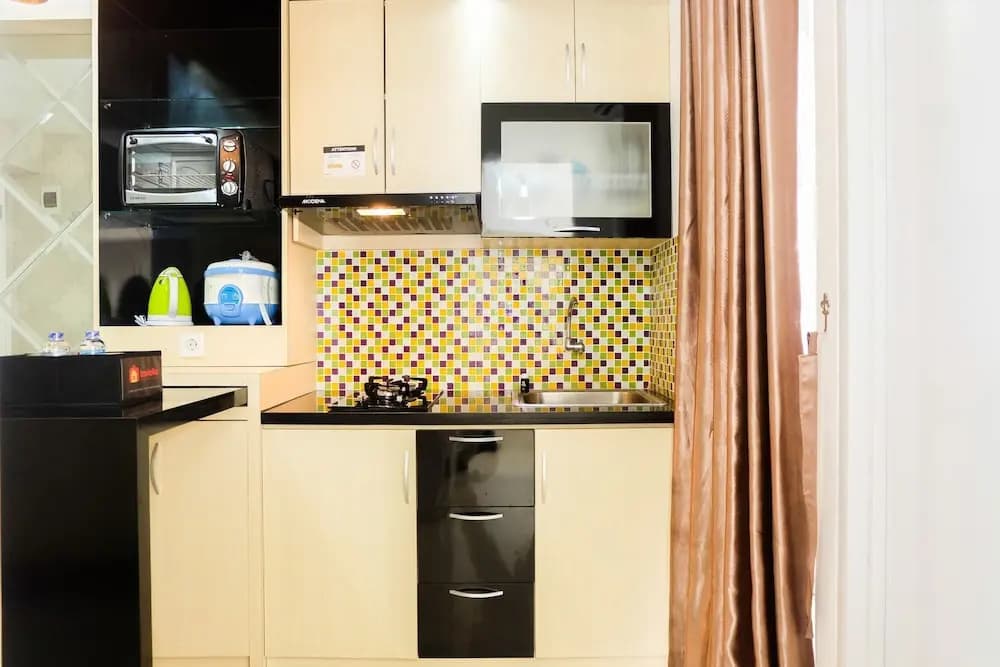 Simply 2BR with Pool View Bassura City Apartment - photo 12