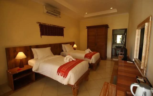 Mina Pelasa Hotel and Resto - photo 3